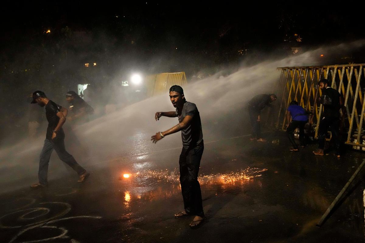 Sri Lanka police tear gas protesters opposed to president