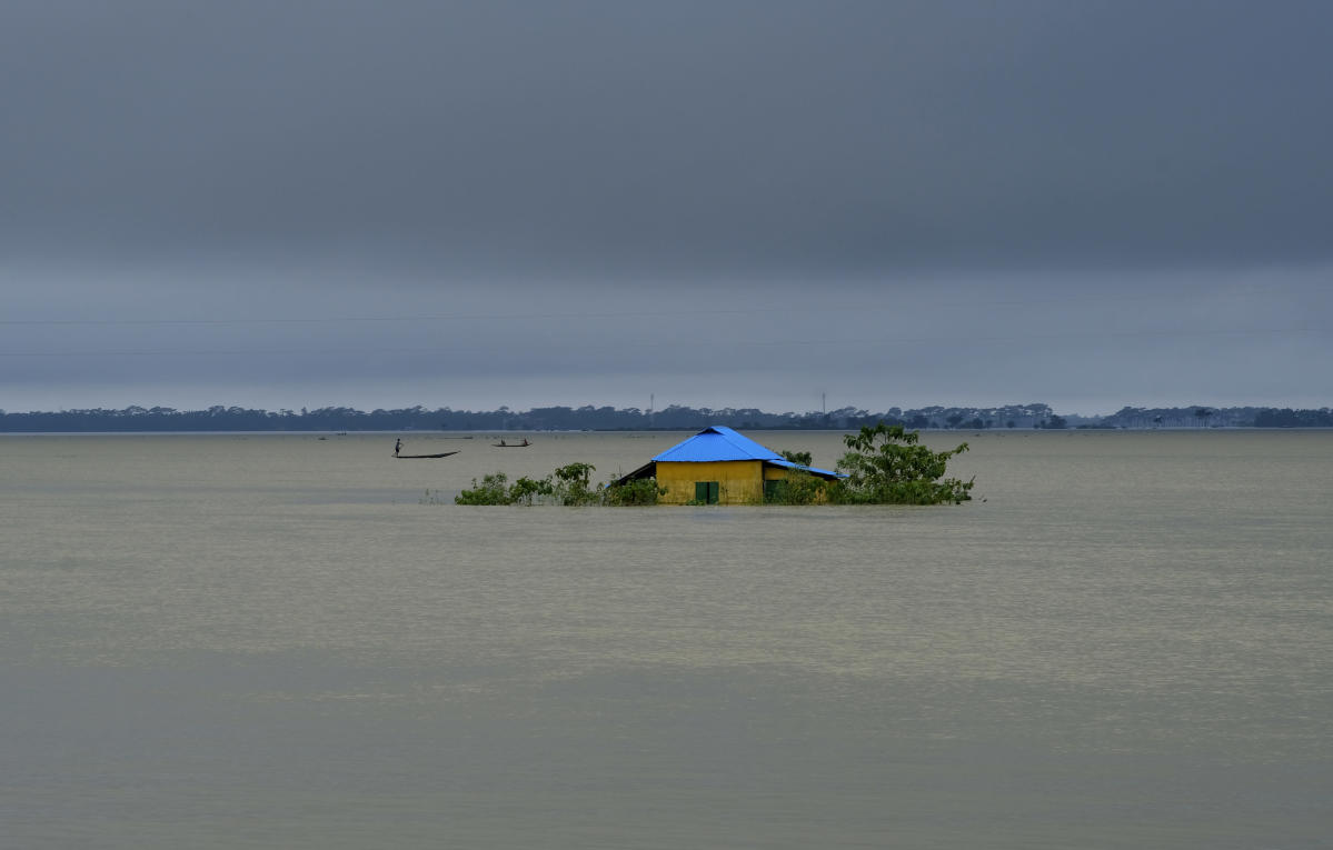 AP PHOTOS: India, Bangladesh floods destroy homes, lives