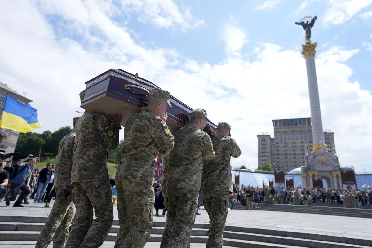 In Ukraine, funeral for activist killed and mourned in war