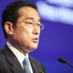 Japan vows bigger security role in region to tackle threats