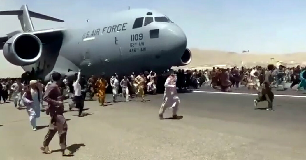 Military Clears Crew of Plane That Took Flight as Afghans Fell to Their Deaths