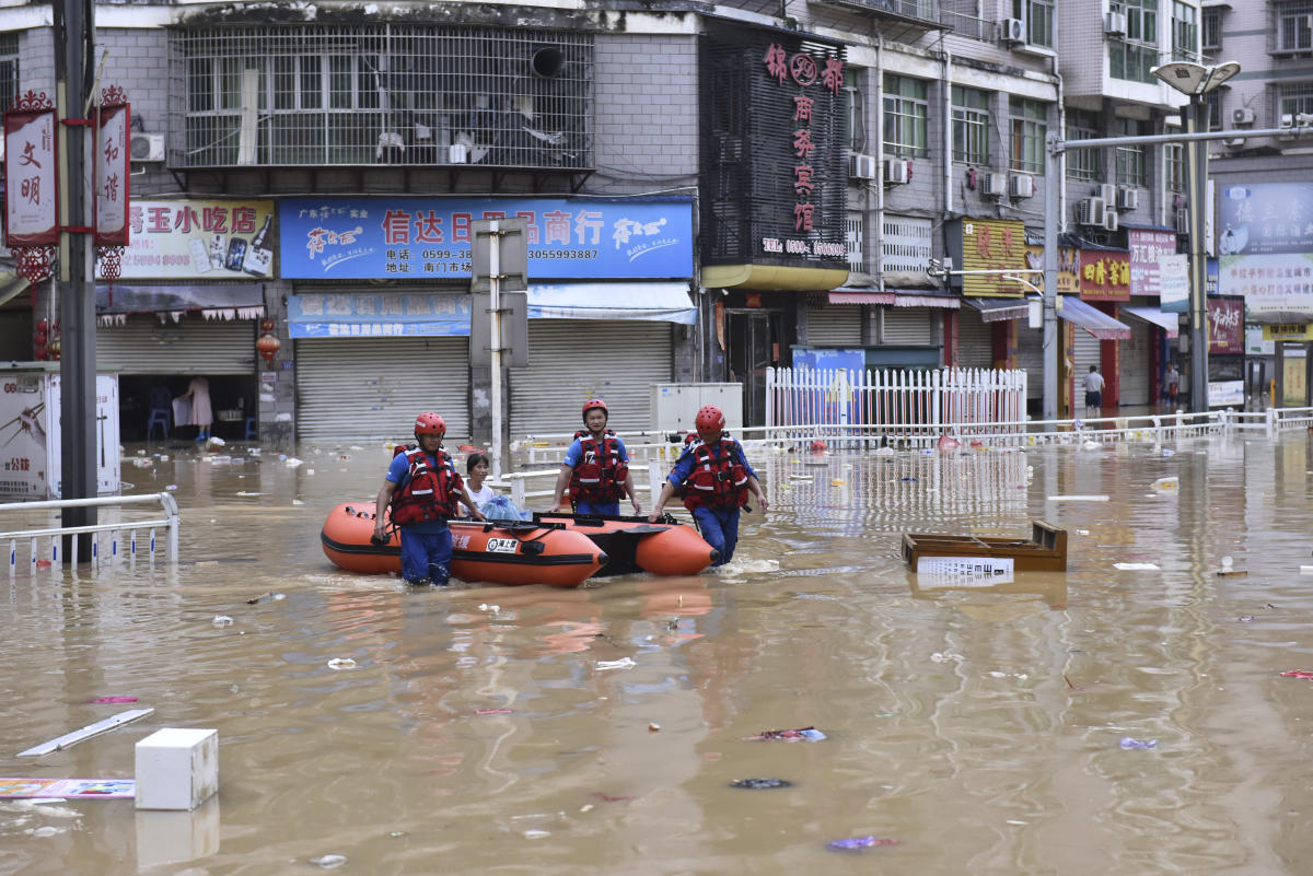 South China floods force tens of thousands to evacuate