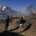 As fires ease in southern Europe, blaze hits Greek capital