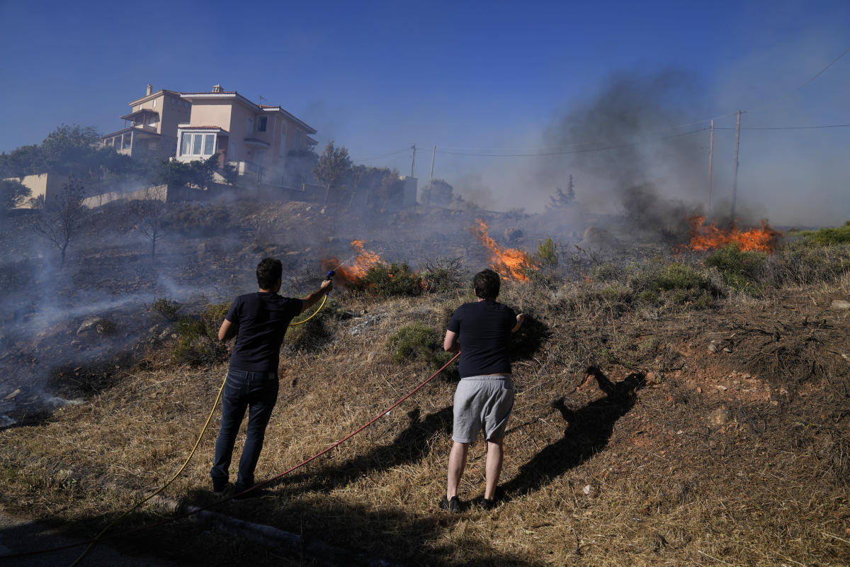 As fires ease in southern Europe, blaze hits Greek capital