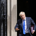 Britain’s Boris Johnson battles to stay as PM amid revolt