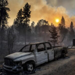 California forest fire burns out of control near Yosemite