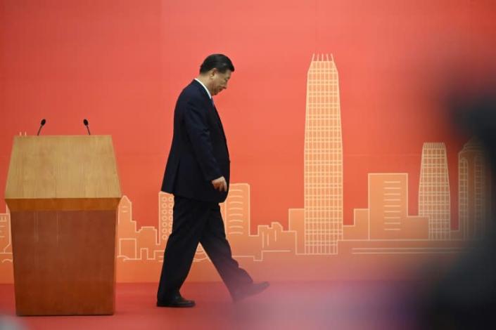 China’s Xi presides over muted Hong Kong handover anniversary