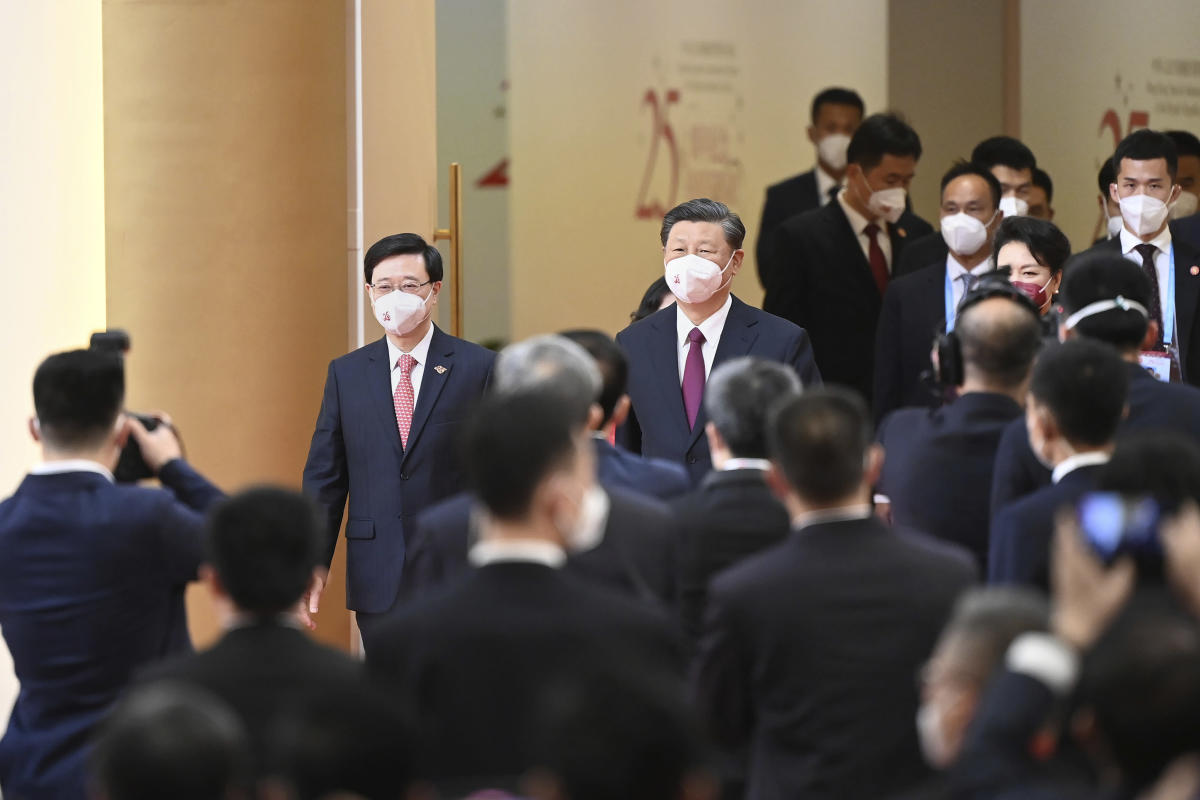 China’s Xi swears in new Hong Kong leader John Lee