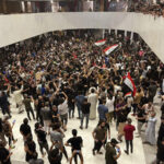 EXPLAINER: What’s behind the storming of Iraq’s parliament?