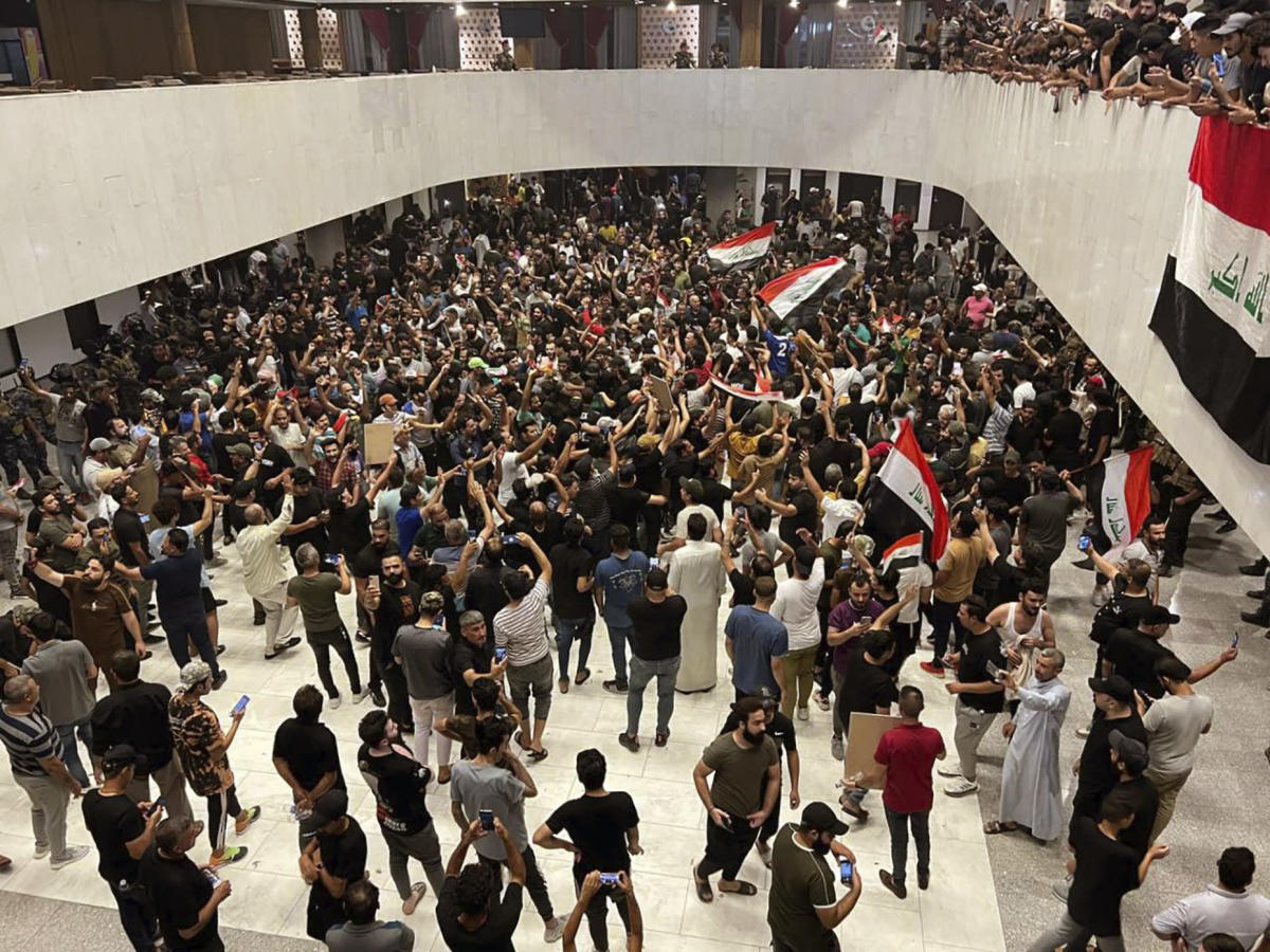 EXPLAINER: What’s behind the storming of Iraq’s parliament?