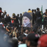 Iraqi protesters storm parliament in Baghdad, set up sit-in