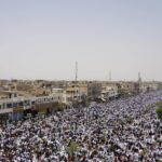 Iraqis arrive to mass prayer in cleric’s show of power