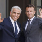 Israel’s Lapid meets Macron in Paris on first trip as PM