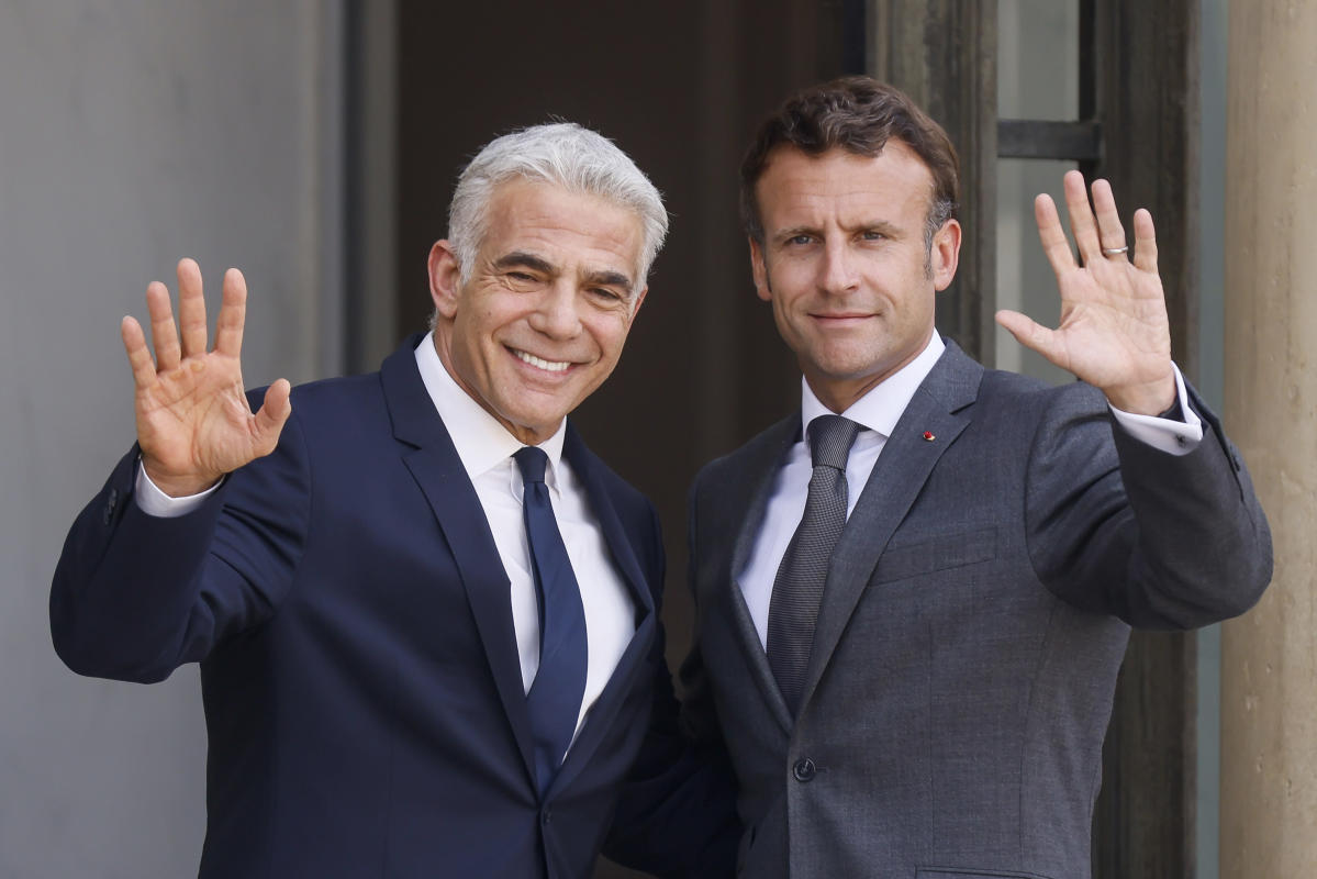 Israel’s Lapid meets Macron in Paris on first trip as PM