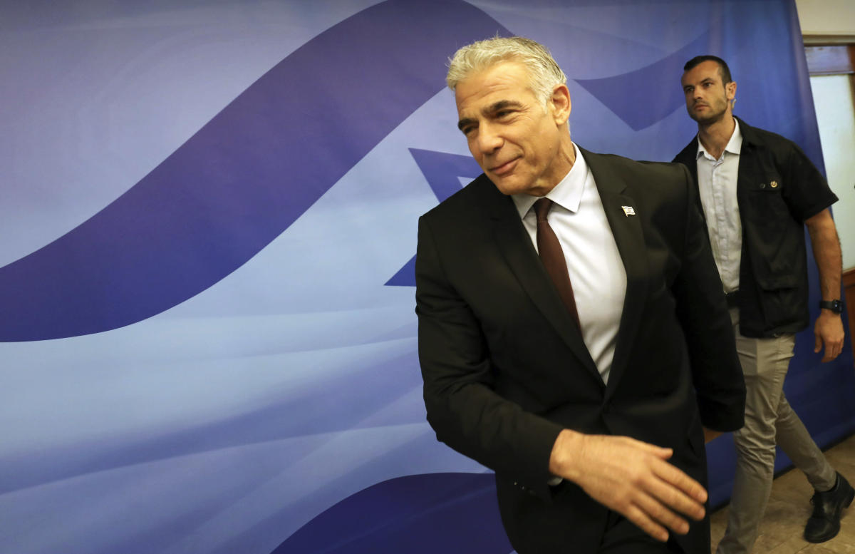 Israel’s Lapid to meet Macron in Paris on his 1st trip as PM