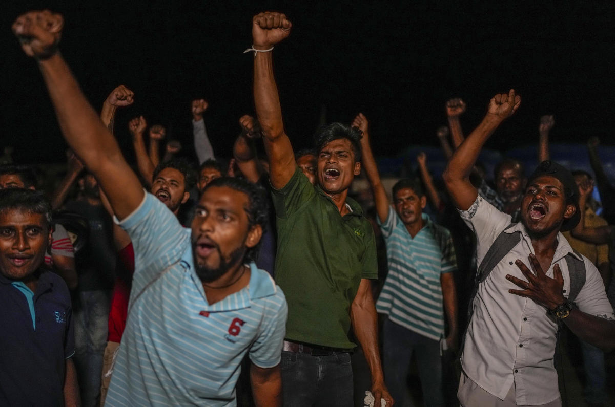 Protesters retreat from Sri Lankan government buildings