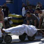 Rio police raid on favela kills at least 18, sparks anger