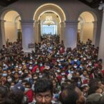 Taking selfies, Sri Lankans converge on presidential palace