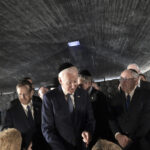 The Latest: Biden says still wants to restore Iran nuke deal