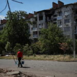 Ukrainian city’s residents urged to evacuate as Russian assault begins