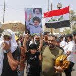 Rival Iraq protests underscore inter-Shiite power struggle