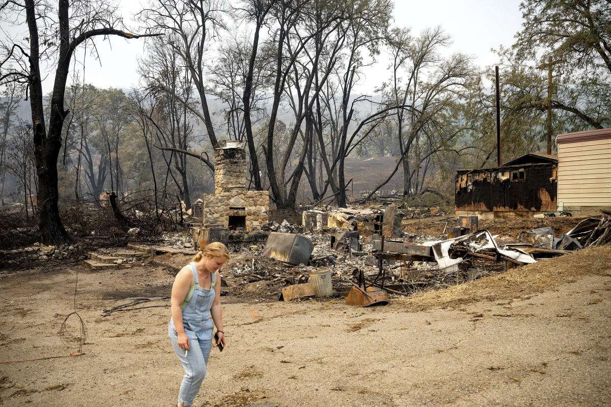 Wind-whipped fire leaves Northern California hamlet in ashes