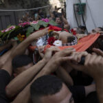 2 Palestinians killed in West Bank, one by local gunmen