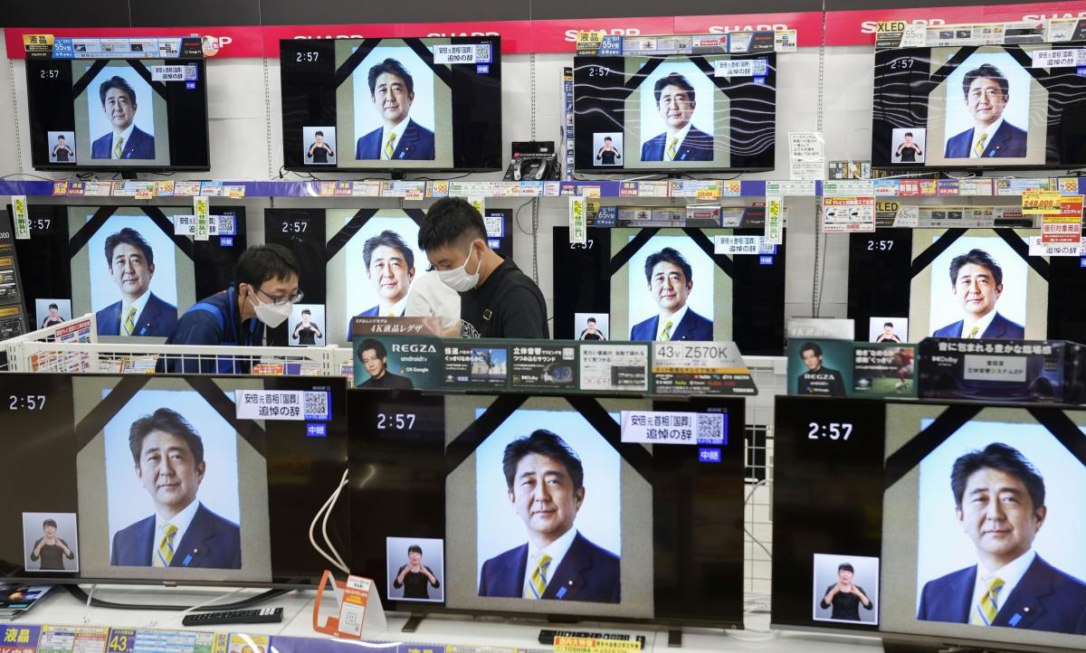 Abe’s militaristic funeral captures Japan’s tense mood