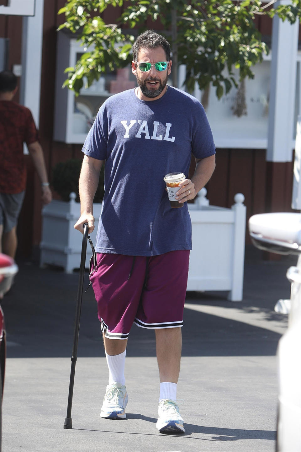 Adam Sandler uses cane as he recovers from hip surgery