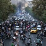 Iran braces for counter rallies as protest deaths mount