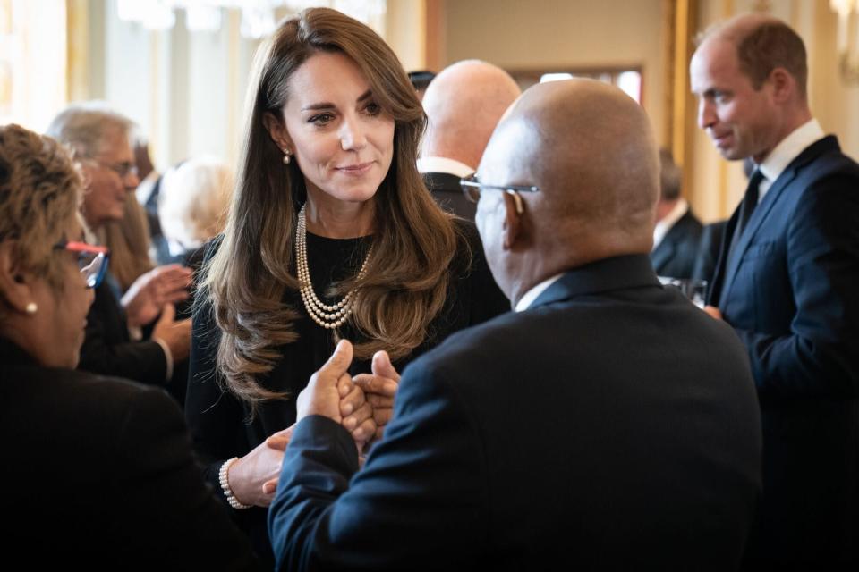 Kate Middleton Wears Queen Elizabeth’s Signature Pearl Necklace at Buckingham Palace Lunch