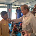 Pakistani premier promises compensation for flood victims