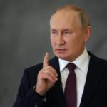 Putin ramps up conscription, cracks down on dissent