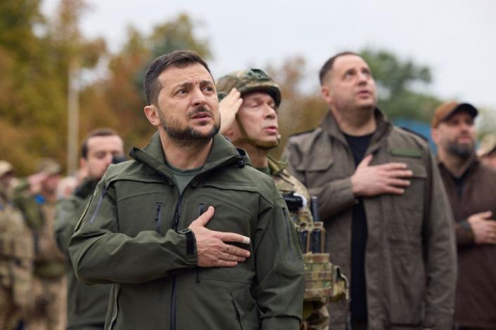 Ukraine war – live: Zelensky praises troops on visit to newly liberated city