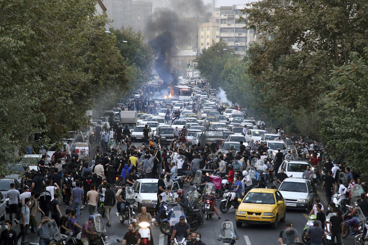 Violent unrest continues in Iran, state TV suggests 26 dead