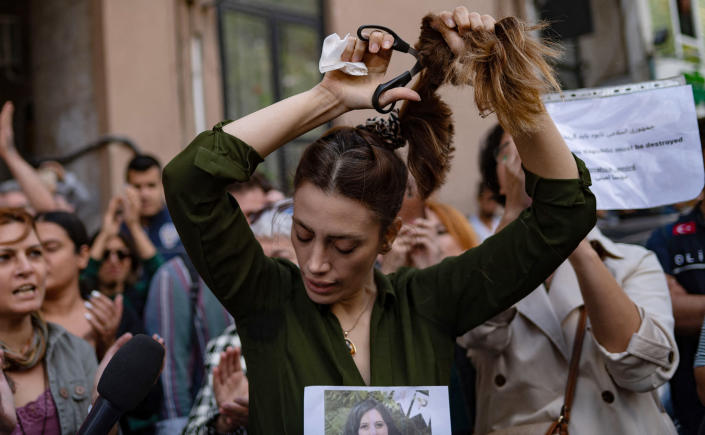 Why Iranian Women Are Cutting Their Hair and Burning Their Headscarves in Protest