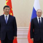 Xi Removes Mask for Putin But Doesn’t Mingle Outside China’s Covid Cocoon