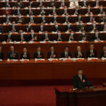 China’s Xi calls for military growth as party congress opens