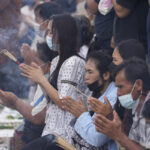 Families leave offerings for children slain at Thai day care