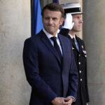 French leader vows to raise retirement age to 65, up from 62