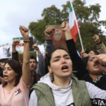 French march in Paris to rally support for women in Iran