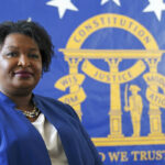 GOP attacks Georgia’s Abrams on voting as judge rejects suit