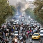 Iranian schoolgirls are removing their hijabs, shouting ‘death to the dictator’ and raising their middle fingers at the country’s leaders