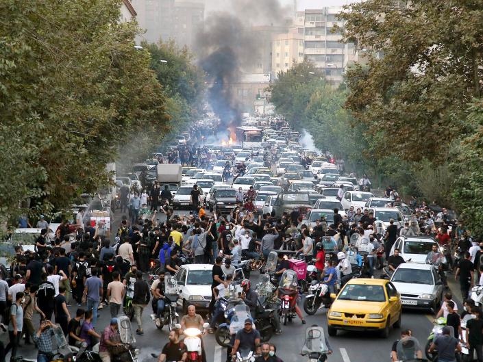 Iranian schoolgirls are removing their hijabs, shouting ‘death to the dictator’ and raising their middle fingers at the country’s leaders