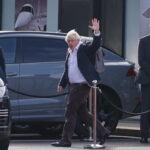 Johnson returns to UK amid rumors he will run for leader