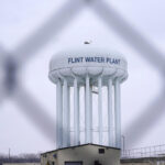 Judge tosses charges against 7 people in Flint water crisis