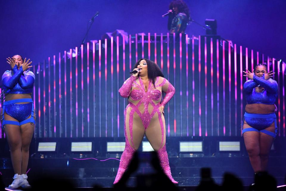 Lizzo appeared to respond to Kanye West’s comments about her weight at Toronto concert: ‘I’m minding my fat Black beautiful business’