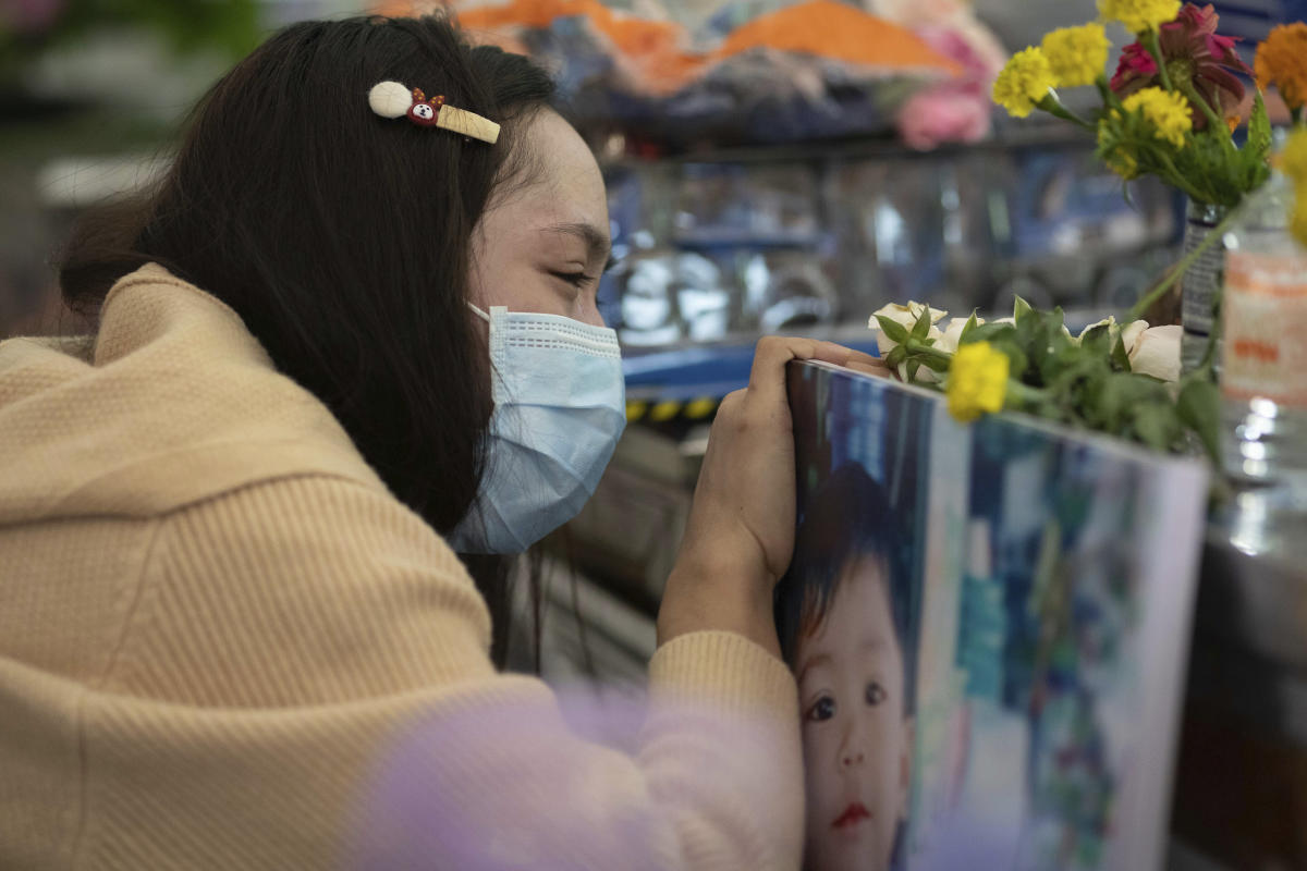 Mourners pray at Thai temple filled by children’s keepsakes