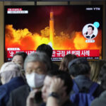 NKorea fires missile and shells, further inflaming tensions