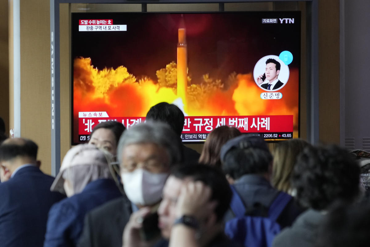 NKorea fires missile and shells, further inflaming tensions